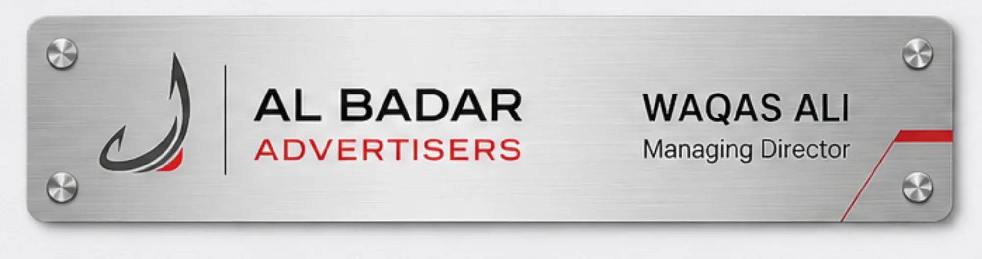 Brushed steel name plate with visible mount screws and dark text