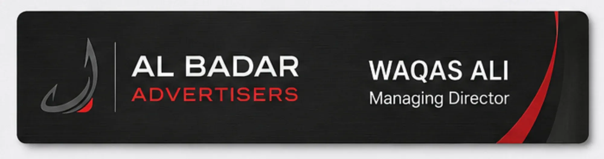 Glossy black acrylic desk name plate with a red accent and white text