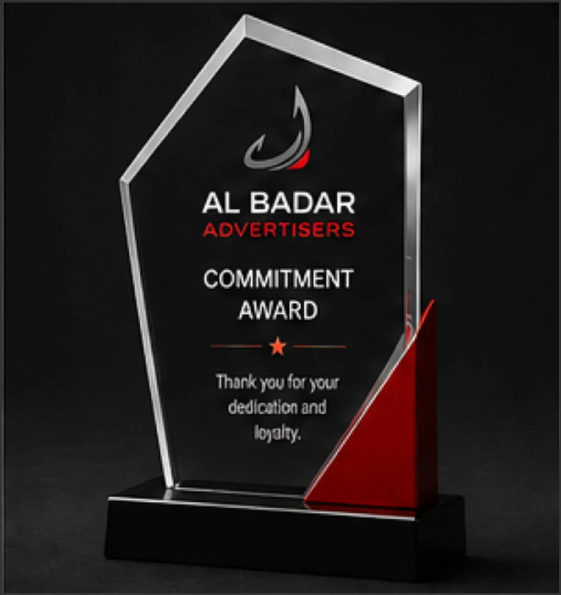 Clear pointed acrylic award with a red accent on a black base