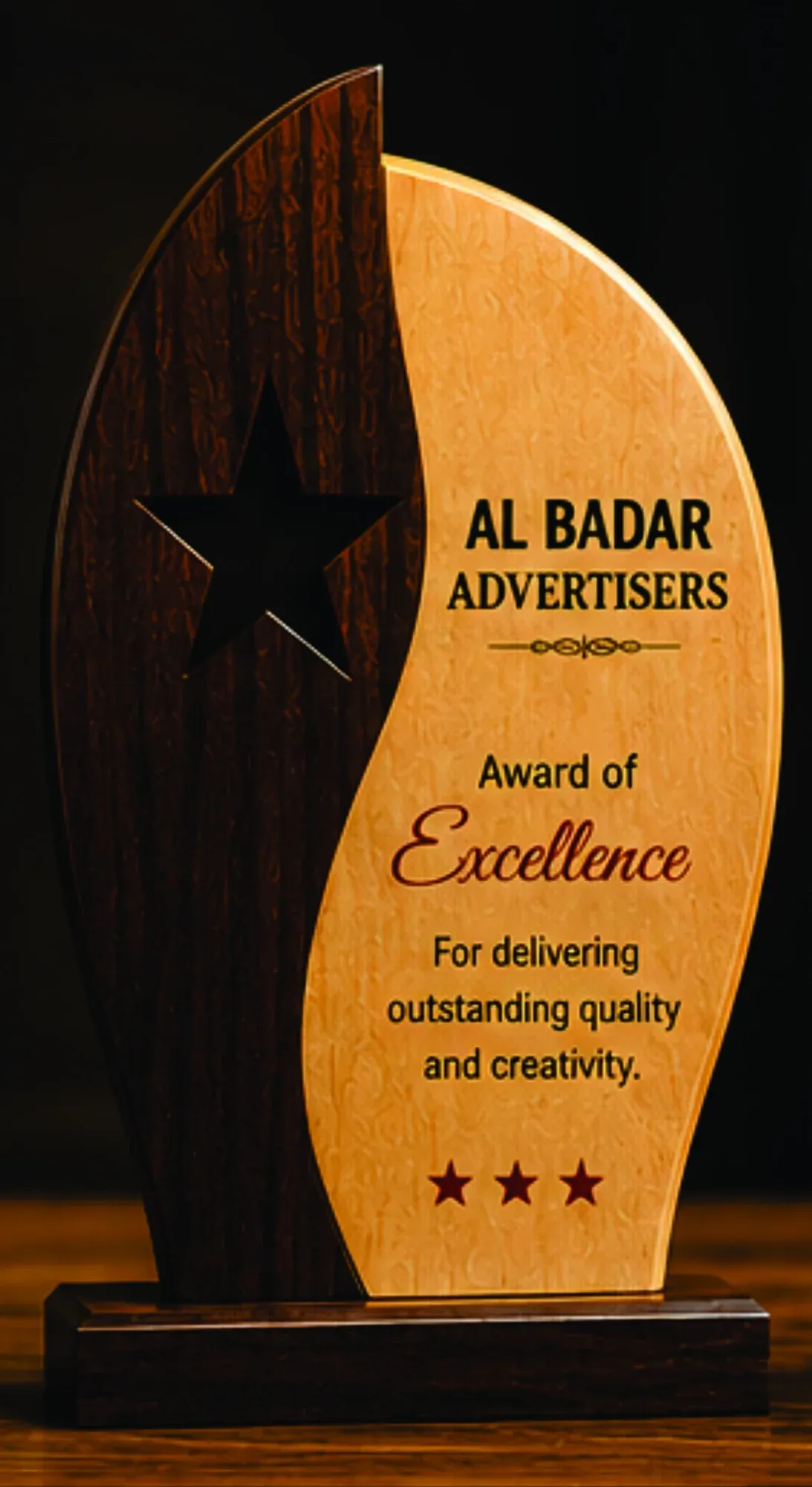 Wooden award with a circular gold-detailed centre and engraved text