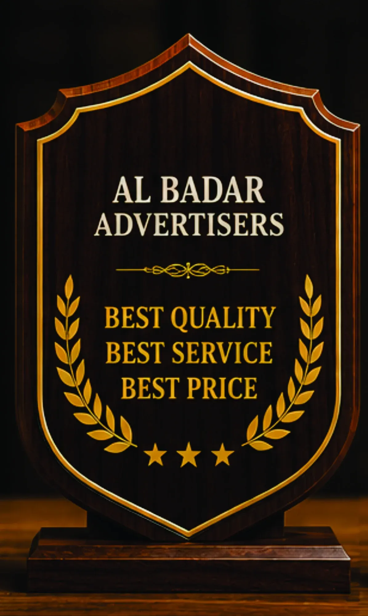 Crest-shaped wooden award with gold laurel detailing and engraved text